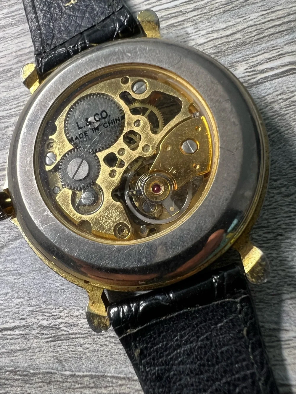 Gold Skeleton Dial Men's Mechanical Watch with Black Leather Strap